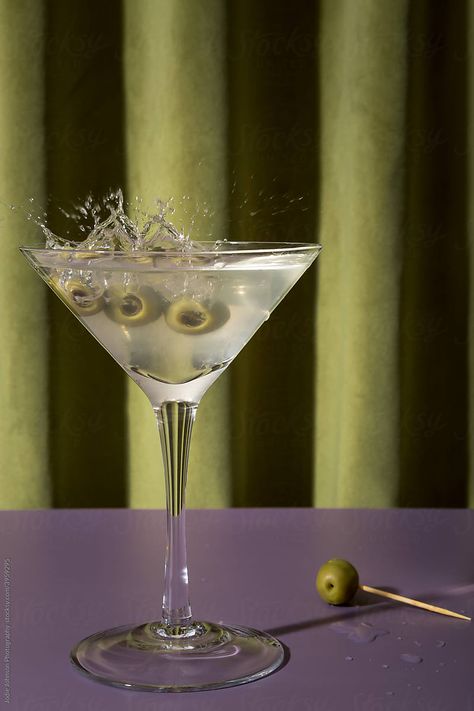 "Olives Splashing Into A Martini Glass" by Stocksy Contributor "Jodie Johnson Photography " Martini Photoshoot, Olive Martini, Bar Business, Martini Olives, Holiday Display, Vert Olive, Martini Glass, Glass Jewelry, Photo Jewelry