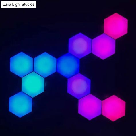 Luna is a modular LED wall light with a brilliant design, easy to install and use. It's the perfect solution for your bedroom or the living room. 
 Use the APP or Remote control to change the brightness and colors. 
 PRODUCT SPECIFICATION: 
 
 Voltage: 5V 
 Wattage: 0-5W 
 Material: Acrylic 
 Power Supply: USB 5V 2A 
 Size: 9*10*1.8 cm 
 Variants Available: Bluetooth APP Control with Music control or Bluetooth APP Control with Remote Control 
 Certifications: CE, FCC, ROHS 
 Please note: If you Mid Century Lighting Pendant, Industrial Ceiling Lights, Classic Chandeliers, Mid Century Pendant, Industrial Wall Lights, Industrial Pendant Lights, Modern Wall Lights, Decor Essentials, Outdoor Wall Lamps