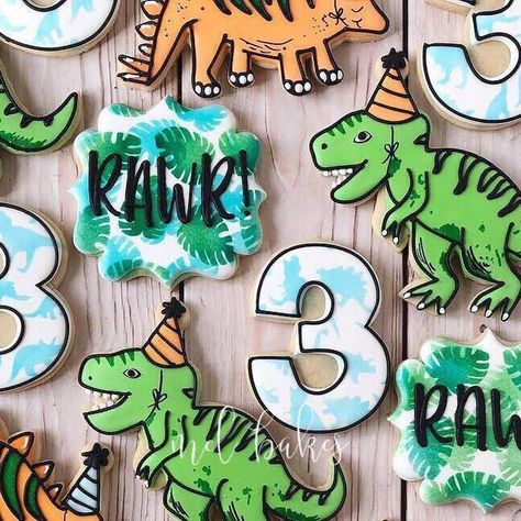 Melissa Wilson on Instagram: "Cute little dinosaur birthday cookies to match the decorations! 🦖🍪 . . #Dinosaurs #TRex #Stegosaurus #DinosaurCookies #Partysaurus #3rdBirthday #3rdBirthdayCookies #Rawr #Cookies #Decorated #DecoratedCookies #Custom #CustomCookies #TulsaCookies #Tulsa #Oklahoma #MelBakesTulsa" T Rex Cookies Decorated, Dinosaur Birthday Party Cookies, Three Rex Birthday Cookies, Dinosaur Birthday Cookies Boys, Dinosaur Cookies 3rd Birthday, 3 Rex Cookies, Dinosaur Decorated Cookies, Three Rex Cookies, Dinosaur Cookies Decorated