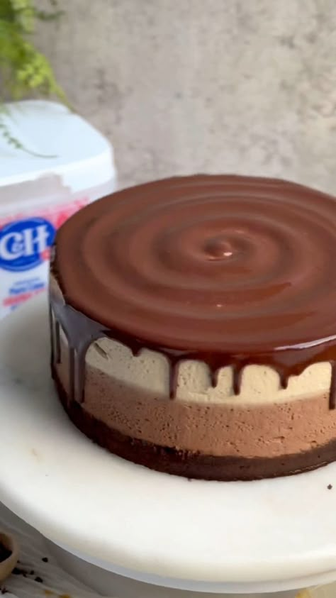 4.7K views · 130 reactions | The most recent incredible Mocha Mousse Cake! Layers of chocolate cake, light and airy chocolate mousse, creamy white chocolate mocha mousse, and a shiny chocolate glaze. Words aren’t enough to describe how divine this is. Grab the recipe at https://bakewithzoha.com/the-best-mocha-mousse-cake/ #mochamoussecake #mochalatte #whitechocolatemochalatte #mochacake #moussecake #chocolatecake #chocolatemoussecake #friendsgiving #dessert #cake #mousse | bakewithzoha | bakewithzoha · Original audio Mocha Mousse Cake, Friendsgiving Dessert, Choc Mousse, Mocha Mousse, Cake Mousse, Cake Light, Mocha Cake, White Chocolate Mocha, Chocolate Mocha