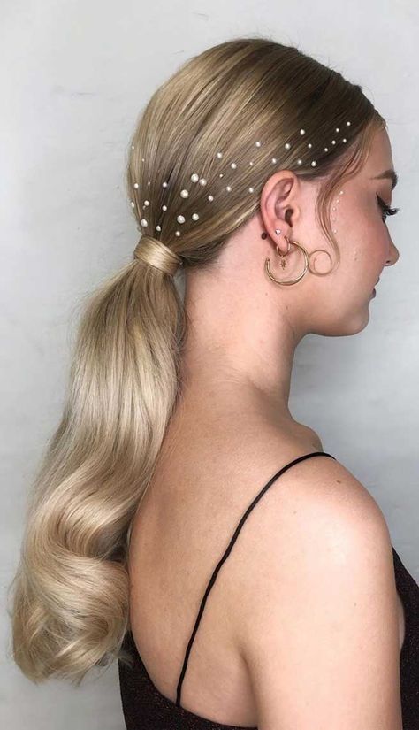 Most of us tend to keep to the same hairstyle every day. We find a style we like and we stick with it, especially... Wedding Ponytail Hairstyles, Bridal Ponytail, Wedding Ponytail, Slick Ponytail, Slicked Back Ponytail, Pony Hairstyles, Elegant Ponytail, Ponytail Hairstyles Easy, Christmas Hairstyles