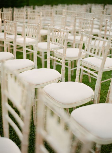 Distressed white chivari chairs.  Event Design: Lavender And Rose | Floral Design: Wayne Riley Flowers.  Photography: Greg Finck - www.gregfinck.com Outdoor Wedding Ceremony White Chairs, Chivari Chairs Wedding, White Chivari Chair, White Folding Chairs Wedding Ceremony, White Chavarri Chairs Wedding, Clear Chiavari Chairs, White Chiavari Chairs, Greg Finck, Wedding Ceremony Chairs