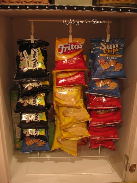 Use+a+chip+rack+to+organize+small+bags+of+chips+in+your+kitchen+or+pantry Pantry Rack, Pantry Redo, Snack Organizer, Small Cupboard, 1920s House, Snack Storage, Kitchen Organization Diy, Chip Bags, Pantry Storage