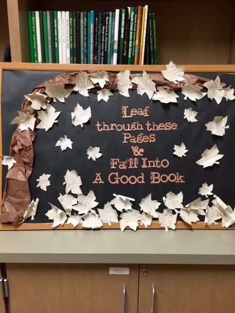 Fall book display. "Leaf through these pages & fall into a good book" Fall Book Fair Decorations, Fall Library Window Display, Fall Library Display Ideas, Fall Library Decor, Fall Book Displays, Fall Library Decorations, Fall Library Bulletin Boards, Book Fair Ideas Display, Book Wrangler