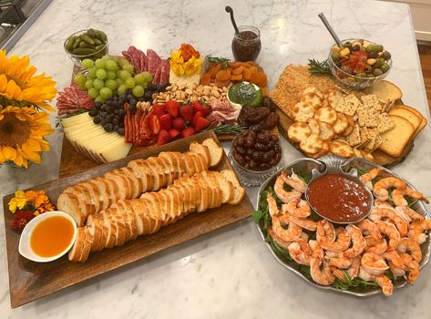 How-to charcuterie board, shrimp cocktail, and sliced french bread with chili oil. So easy but you won't believe how elegant it is when it all comes together! More easy entertaining tips on Cobi's Kitchen Charcuterie Board With Shrimp Cocktail, Shrimp Cocktail Board, Shrimp Cocktail Charcuterie Board, Charcuterie Board With Shrimp, Shrimp Charcuterie Board, Bread With Chili, Chacuterie Board, Seasoned Nuts, Maldon Sea Salt Flakes