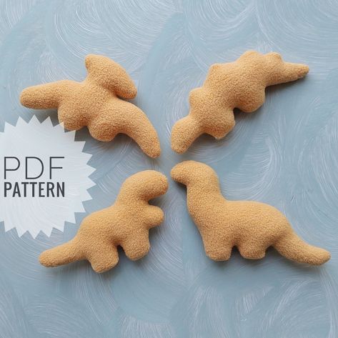 Dino chicken nuggets pattern. This product contains PDF pattern and tutorial. Easy to follow. You can sew 4 cute plush dino nuggets with this pattern! Note! This is not a finished product. This is just a pattern! Thank!) Please, if you have any questions, contact me. Yours sincerely, Jane. Stuffie Sewing Patterns Free, Cute Easy Sewing Patterns, Cute Pillows To Sew, Simple Sewing Patterns Stuffed Animals, Felt Plush Pattern Free, Simple Stuffed Animal Pattern Sewing, Sewed Animals, Dino Sewing Pattern Free, Easy Hand Sewn Stuffed Animals