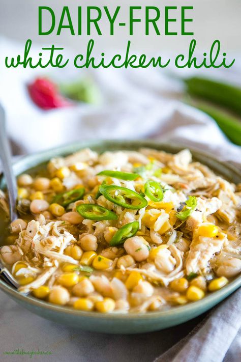 This Dairy-Free White Chicken Chili is perfect for a cold winter day! It's creamy and packed with white beans and veggies, with no milk, cream or cheese! Recipe from thebusybaker.ca! #dairyfree #chickenchili #winter #soup #stew #chili #homemade White Chicken Chili Recipe Crockpot, Chili White, Chili Healthy, White Chicken Chili Healthy, White Chicken Chili Slow Cooker, Crockpot White Chicken Chili, Winter Soup Recipe, White Chili Chicken Recipe, French Onion Soup Recipe