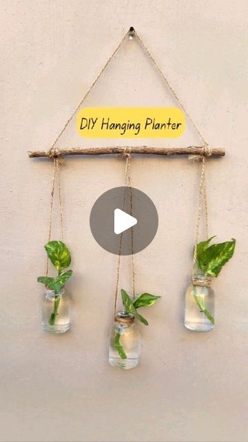 Bloomy on Instagram: "DIY Wall Hanging Mini Planter. I made this planter by using old mini glass bottles. Let me know if you have any questions. 😊 . . . #diyplanter #hangingplanter #diy #reuse #plantdecor #sustainableart #enviromentallyfriendly #creativeideas #wastetoart" Hanging Glass Bottle Plants Ideas, Planters Ideas Indoor Diy, Mason Jar Hanging Planter, Diy Hanging Planter Easy, Diy Hanging Propagation Station, Wall Planters Indoor Diy, Glass Bottle Planters Diy, Bottle Hanging Plants, Hanging Bottles Decoration