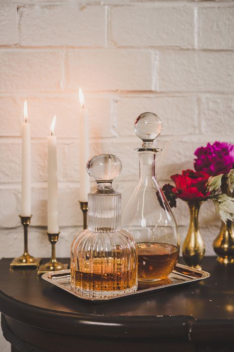 A Swanky Engagement Shoot styled for The Not Wedding - www.theperfectpalette.com - Jason Hales Photography Decanter Aesthetic, Whiskey Decanter Display, Whiskey Bar Wedding, Decanter Display, Styled Engagement Shoot, Bandeja Bar, Bourbon Bar, Bar Station, Thanksgiving Tablescape