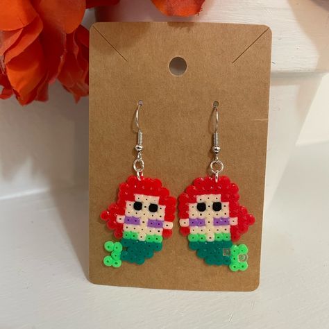 Perler Bead Disney Princess Ariel Earrings Red, Peach, Black, Purple, Green And Light Green New Handmade 1.5” Inches Perler Beads Bundle To Save Don’t Be Afraid To Send Offers :) Disney Perler Bead Earrings, Perler Beads Ideas Disney, Small Perler Bead Patterns Minis, Disney Perler Beads, Cross Stitch Earrings, Pokemon Earrings, Perler Earrings, Unique Dangle Earrings, Easy Perler Bead Patterns