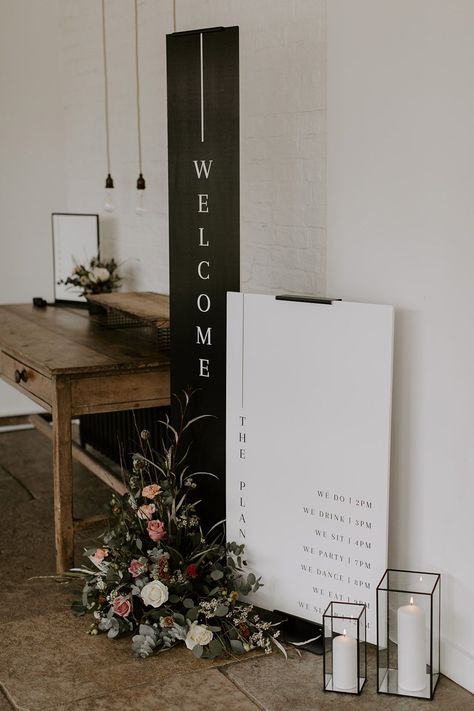 Tall vertical black and white wedding welcome sign with black and white order of the day sign surrounded by pink wedding flowers Black And White Wedding Signage, Black Wedding Sign, White Wedding Welcome Sign, Pink Wedding Sign, Rustic Wedding Signage, Order Of The Day Sign, Wedding Entrance Sign, Brand Party, Event Signs