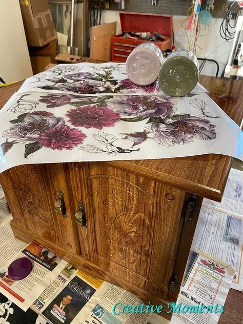 Can you paint the faux laminate pressboard wood pieces? yes you can let me show you how. This end table is super shiny faux wood and very dated but is a good size perfect to makeover in a fun color with transfers.﻿The leaves carved in the door add to the botanical theme. Step one was with vacuum inside and out and under then spray clean and wipe yet again. After much decision I chose this pretty buds and branches  Dixie Belle transfer and narrowed it to these 2  Dixi… Botanical Theme, Dollar Store Hacks, Fun Color, Diy Table, Silk Painting, Wood Pieces, Faux Wood, End Table, Kotatsu Table