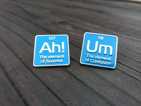 Display your passion for the sciences with these elemental enamel pins.  These science lapel pins are the perfect gift for science teachers, scientists or just your general science nerd. You can wear your science enamel pin badges on a bag, jacket, lapel, pin board, or use it as a hat pin.   I incorporated periodic elements into the design to convey my love of science in an aesthetically pleasing way. 2 enamel pins Soft enamel silver plating comes with butterfly clutch and backing card 1 inch from the widest points (25.4mm) Periodic Element, Science Pins, Periodic Elements, General Science, Element Of Surprise, Science Nerd, Backpack Pins, Jacket Pins, Smink Inspiration