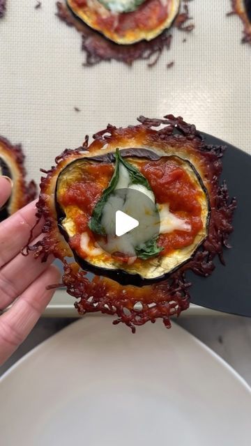 Ereka Vetrini on Instagram: "Bored of your snack choices? Try my EGGPLANT FRICO! It’s the perfect low-carb snack!!

Ingredients:
1 eggplant sliced into 1/2 inch thick circles
1/2 tbsp of salt (approximately)
1 tbsp olive oil
1 rounded tbsp of grated Parmigiano Reggiano per eggplant slice
1 rounded tbsp sauce per slice
1 tbsp shredded mozzarella per eggplant slice
1 piece of basil per eggplant slice

Roasting the Eggplant:
-Preheat oven to 400F.
-Generously salt the sliced eggplant and let sit for 15-30 minutes.
-Using a paper towel, wipe the “sweat” and most of the salt from the eggplant and place on a parchment lined baking sheet.
-Brush with olive oil and roast for 30 minutes.

Making the Frico:
-Preheat oven to 400F.
-Line a separate baking sheet with a silicon mat or parchment paper. Eggplant Zucchini, Eggplant Recipes Easy, Low Carb Low Fat Recipes, Eggplant Dishes, Roast Eggplant, Vegetarian Side Dishes, Summer Snacks, Eggplant Recipes, High Protein Snacks