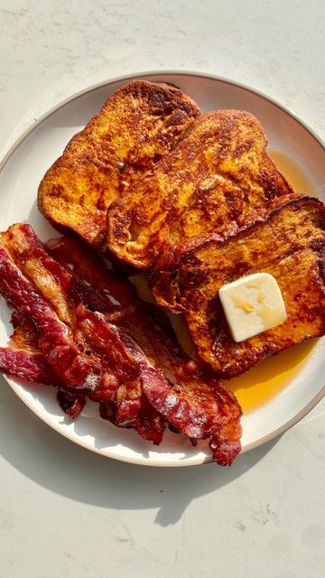 Ryan Nordheimer on Instagram: "PUMPKIN FRENCH TOAST WITH BACON 🎃🥓🍁  When I took a bite of this dish, I knew instantly it was a winner. Getting a bite of both French toast and @godshalls beef bacon perfectly coated in maple syrup, it’s heaven. This only takes about 20 minutes front-to-back, so it’s a perfect recipe for weekend breakfasts or even a naughty work-from-home midweek lunch 🥓 Make sure to bake up plenty of bacon—it’s the best part.   INGREDIENTS 🛒 -1 pack @godshalls beef bacon -1 loaf cinnamon bread (like babka or brioche) -2 eggs -2/3 cup milk -2 tsp pumpkin spice -1/4 cup pumpkin butter -2 tbsp butter -Maple syrup, for serving . . . . . . #ad #GodshallsTurkeyBacon #GodshallsSteakBacon #GodshallsBeefBacon #GodshallsBaconMyHeart #GodshallsGrillin #GoForGodshalls" French Toast Bacon, Bacon Stuffed French Toast, Baked French Toast, Maple Bacon French Toast, Toast With Butter Aesthetic, Martha Stewart Bacon Egg And Cheese Baked French Toast, Pancakes And Bacon Aesthetic, Beef Bacon, Pumpkin French Toast