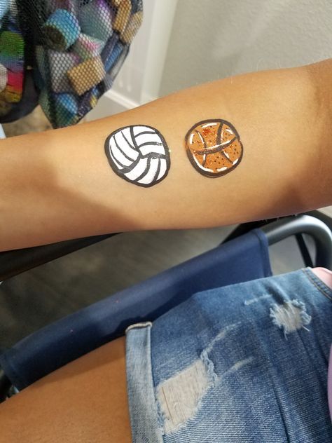 Volleyball and basketball cheek art face painting Volleyball Face Paint, Art Face Painting, Cheek Art, Face Paints, Face Painting Easy, Pep Rally, Art Face, Face Tattoos, Face Painting Designs