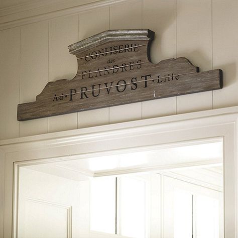 I have been Jonesing for this sign for a while now. I'ts big. almost 8 ft, and I lovethe shape of it! I want it for my dining room. (Actually, I want the whole dining room from the Ballard's catalog, but one thing at a time.) But this sign is $289. wow. Really!? So I decided to make my own sign, Bet I can get it done for WAY less than $289! First I made my template and cut out my sign from 1x6 pine lumber. After gluing and screwing it all together, I started on the finish. This sign has ... Cottage Fairytale, Wall Accents Decor, Wooden Bar Stools, Interior Design Advice, Decorative Wall Plaques, Hand Painted Walls, Candle Wall Sconces, Family Name Signs, Ballard Designs