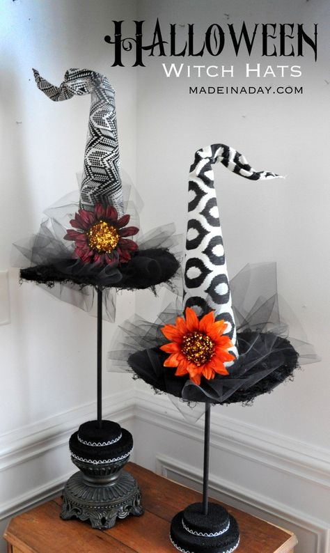 Add some glam with these funky Halloween Witch Hats Topiaries! A modern spin on Halloween witch hat decorations. Try this fun witch hat crafts for Halloween. Funky witch hat, ikat, geometric fabric, tulle, #DIY #witchhat #witch #hocuspocus #topiaries #halloween Porta Halloween, Witches Lair, Halloween Decorations Outdoor Porch, Beautiful Witches, Dekorasi Halloween, Witches Hats, Witch Shoes, Spooky Things, Witch Diy