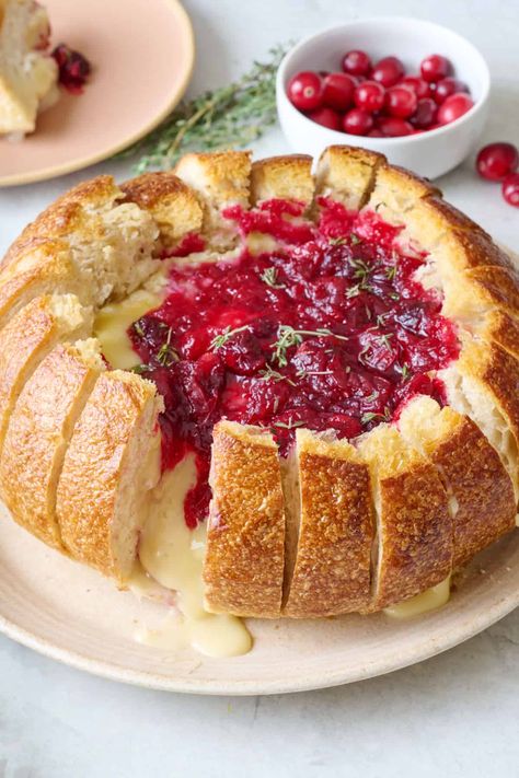 Baked Brie Cranberry in Bread Bowl - Feel Good Foodie Baked Brie Bread Bowl With Jam, Baked Bree With Cranberry, Brie Bowl Bread, Pampered Chef Brie Recipe, Brie Cranberry Appetizer, Cranberry Brie Bread Bowl, Christmas Buffet Menu, Cranberry Brie Bread, Baked Brie With Cranberries