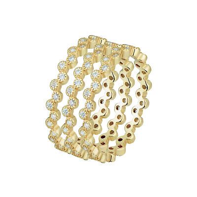 https://michaelaukjewelry.co.uk Made from 925 sterling silver with yellow gold plating, these rings feature a wavy zig zag eternity stack band design and are adorned with cubic zirconia stones. The stones are a round simulated cubic zirconia in clear, and the setting is bezel. Trio Ring, Wavy Design, Rings Jewelry Fashion, Bridal Bands, Clear Stone, Gold Plated Rings, Bridal Ring, Stone Cuts, Bridal Rings