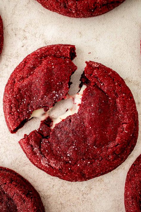 These thick, soft and chewy stuffed red velvet cream cheese cookies have the best flavors of red velvet cake. Stuffed with a tangy, fluffy cream cheese frosting, these cookies are perfect for a gift, cookie swap or holiday event. Red Velvet With Cream Cheese Frosting, Chewy Red Velvet Cookies, Red Velvet Cookies With Cream Cheese Filling, Red Velvet Cookies From Cake Mix Easy Cream Cheese, Soft Red Velvet Cookies, Cream Cheese Stuffed Red Velvet Cookies, Holiday Cookie Flavors, Red Velvet Christmas Cookies, Red Velvet Stuffed Cookies