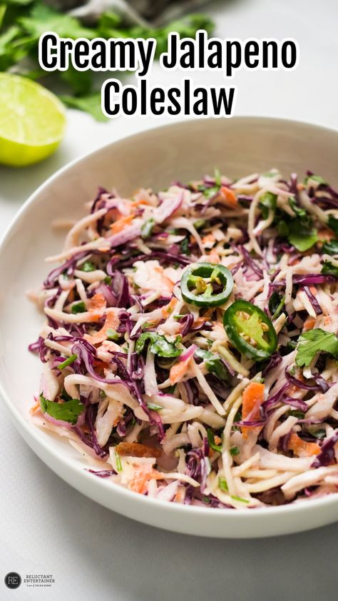 Jalapeno Coleslaw is creamy, crunchy, tangy, and a bit spicy, and it’s the perfect salad to pair with burgers, seafood, steaks, and more! Jalapeño Cole Slaw, Spicy Coleslaw Dressing, Jalapeno Coleslaw Recipes, Jalapeño Coleslaw, Jalapeno Slaw, Spicy Slaw, Healthy Coleslaw Recipes, Chicken Cranberry, Spicy Coleslaw