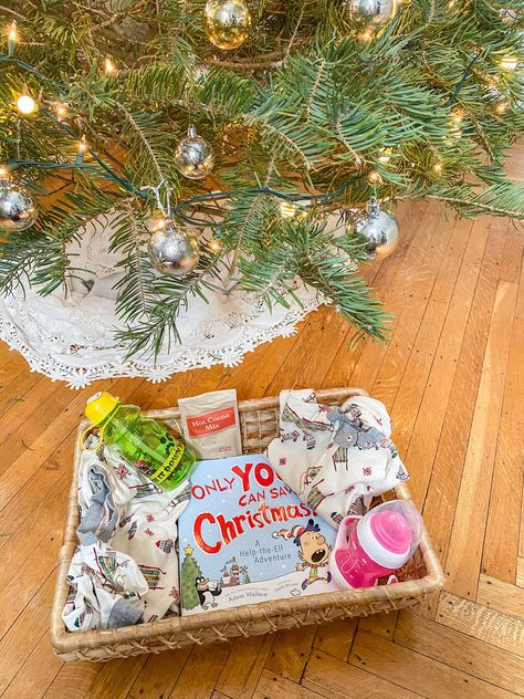 A new Christmas tradition--a box filled with goodies for the kids to open on Christmas Eve.  Easy to put together and a fun treat for Christmas Eve. #christmas #christmaseve #motherhoodtips #motherhoodhacks #toddler #baby #christmasideas Elf Basket Ideas, Christmas Basket For Kids, Christmas Eve Box Ideas For Toddlers, Christmas Eve Box Ideas, Box Ideas For Kids, Future Christmas, Halloween Gift Baskets, Teacher Gift Baskets, Valentine's Day Gift Baskets