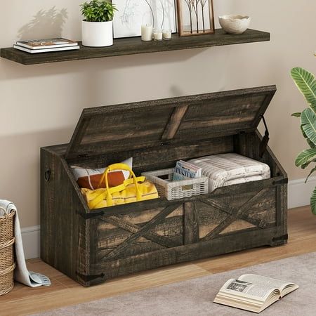 Elevate your home with the Farmhouse Storage Chest, a versatile piece that blends rustic charm and modern functionality. Crafted from quality wood, this 39.4" storage trunk offers ample space for blankets, toys, and more. The sloped top design adds visual interest and a handy display surface. Smooth-rolling casters allow easy mobility, while the safety hinge ensures gentle lid closure. Whether in the entryway, bedroom, or living room, this farmhouse-inspired storage solution is a practical and stylish addition. Specifications: Color: Brown Material: Engineered Wood Product Size: 15.7"D x 39.4"W x 18.5"H Product Weight: 38.03 lb Package Contents: 1 x Storage Chest 1 x Accessory Kit 1 x Instructions Farmhouse Storage, Bench Storage, Storage Trunk, Entryway Bedroom, Wood Product, The Farmhouse, Rustic Brown, Wooden Storage, Bench With Storage