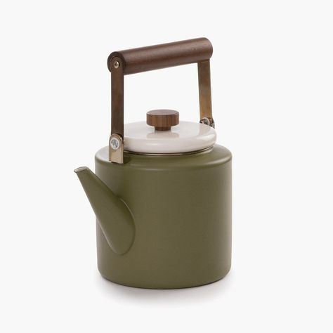 The enamel 2-tone kettle features a beautiful bulky walnut handle and pull-top, speckled white lid, and olive drab body. Use this vintage-inspired kettle for steeping tea, warming cocktails, simmering broth, and boiling water for hot chocolate and coffee. It’s durable enough for your dinnerware camp set and elegant enough for indoor use--stored on the stove next to your favorite cast iron.Our two-tone enamelware is crafted with a solid steel core and a rust-resistant heated glass exterior, produ Electric Kettle Aesthetic, Tea Kettle Aesthetic, Enamel Kettle, Warm Cocktails, Pour Over Kettle, Glass Exterior, Chocolate And Coffee, House Pool, Enamel Teapot