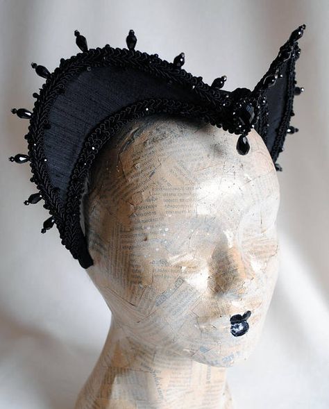 This impressive gothic attifet headdress, is covered with black silk shantung and embellished with black cord trimming all around the edges.It is further trimmed with black crystal details that create a halo effect as well as small black crystal beads that were hand-sewn on the trimming Vampire Headpiece, Headdress Ideas, Medieval Headwear, Festival Headpiece, Medieval Belt, Dragon Dreaming, Gothic Vampire, Elegant Dresses Classy, Cocktail Hat