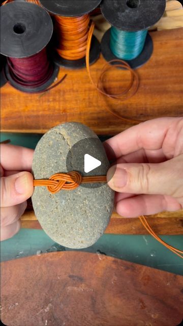 Lori Marshall on Instagram: "When you love what you do!" Weaving Around Rocks, Stone Diy Crafts, Zen Stones Art, Diy Rock Wrapping, Weaving On Rocks, Rock Wrapping Diy Tutorial, What To Do With Rocks, Rock Sculpture Diy, Rock Wrapping Diy