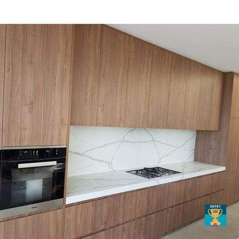 A rich caramel toned walnut woodgrain pattern with grey-brown defined grain highlights throughout.  Polytec Notaio Walnut used in this stunning kitchen.  Product - WOODMATT 🎨Colour - Notaio Walnut 👨‍🔧Cabinetmaker - @kds_cabinets_kitchens_and_bath 👉Entry 4 - ICM Geelong @polytec Awards Polytec Kitchen, Walnut Bathroom, Walnut Uses, Bosch Dishwasher, Kitchen Updates, Walnut Kitchen, Woodgrain Pattern, Interior Design Mood Board, Stunning Kitchens