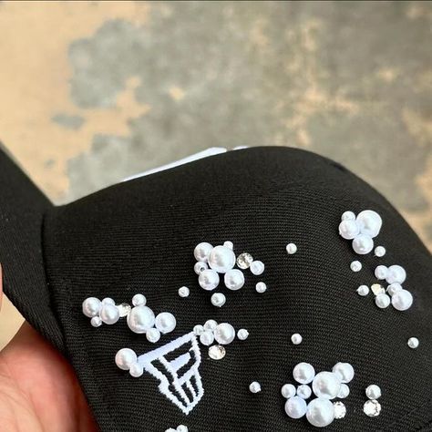 Creative Studio on Instagram: "svarovski/pearls prototype by @aguv4ro.studio 
great combination don’t you think?🫧✨

#customcap #creative #paris #svarovski #pearls #craftmanship #prototype #custom #fashion" Custom New Era Hats, Aesthetic Fashion Men, Pearl Hat, Custom Jeans Diy, Custom Fitted Hats, Hat Diy, Dope Hats, Pretty Hats, Custom Caps