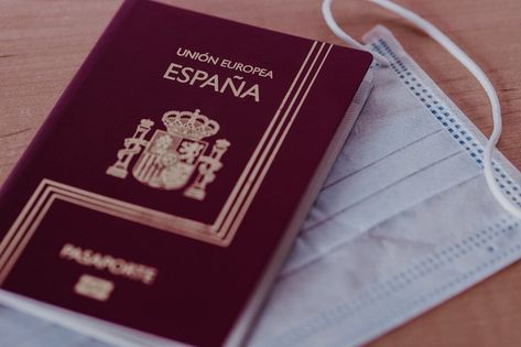 Spanish passport and face mask protection. Inability to travel around the world Spanish Passport, Mask Protection, Travel Around The World, Travel Around, Around The World, Face Mask, Around The Worlds, Mask, The World