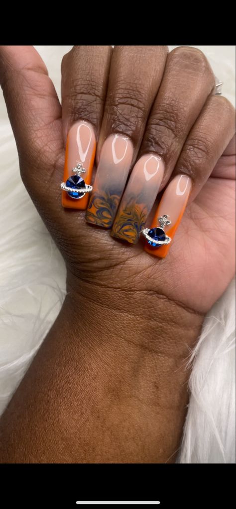 #orangenails #bluenails #marblenails #ombrenails Navy Blue And Burnt Orange Nails, Blue Orange And White Nails, Blue Nails With Orange Design, Burnt Orange And Blue Nails, Orange Blue And White Acrylic Nails, Nail Designs Orange And Blue, Blue And Orange Marble Nails, Orange And Blue Nails, French Tip Design