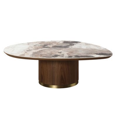 The Willene Coffee Table epitomizes contemporary elegance with its sleek design and walnut finish that exudes warmth and sophistication. Its ceramic table top not only adds a touch of luxury but also ensures durability and easy maintenance. This table is crafted to be a versatile centerpiece in any modern living room, offering both style and practicality with its minimalist yet refined aesthetic. ACME Furniture | ACME Furniture Willene 43" Oval Coffee Table w / Ceramic Top In Walnut brown / whit