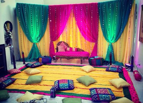 Ladies Sangeet; Pillows to sit on; Could be outside by the pool Mehendi Props, Mehndi Decoration Ideas, Mehndi Stage, Mehendi Decor Ideas, Ladies Sangeet, Mehendi Decor, Marriage Decoration, Desi Wedding Decor, Mehndi Decor