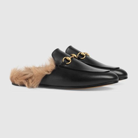 $995.00 GUCCI - Gucci Princetown leather slipper - affiliate - The Princetown slipper is fully lined and trimmed with lamb wool then finished with our signature Horsebit detail.  Black leather  Horsebit detail  Elongated toe  Leather sole  Flat These shoes run small, we recommend sizing up half a size  Lamb wool lining  Made in Italy Princetown Gucci, Gucci 2015, Gucci Princetown, Fur Mules, Gucci Store, Stitch Fit, Gucci Gifts, Fit Fashion, Loafer Mules