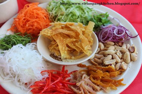 Yee Sang is a popular festive dish contains variety of colourful prosperous ingredients which usually served on the 7th day of Chinese... Yee Sang, Nasi Lemak, Malaysian Food, Kitchen Dishes, Fish Bowl, The Balance, Round Up, Chinese Food, Chinese New Year