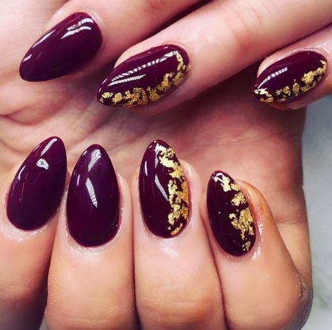 Oxblood And Gold Nails, Berry And Gold Nails, Red And Gold Foil Nails, Plum And Gold Nails, Fall Nails With Gold Flakes, Fall Nails Gold Flakes, Fall Foil Nails, Dark Red And Gold Nails, Burgundy Gold Nails