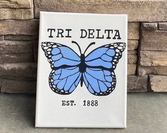 Simple Sorority Canvas, Blue Sorority Canvas, Tri Delta Canvas Painting, Delta Zeta Canvas Painting, Tri Delta Canvas, Aoii Canvas Ideas, Axo Canvas, Purple Sorority Canvas, Sorority Canvas Ideas