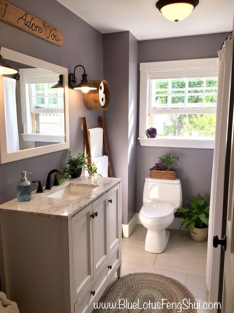 Stunning Farmhouse rustic bathroom with Sherwin Williams Gris Morado paint. #farmhouse #bathroom #grismorado #sherwinwilliams #IWANT https://www.sherwin-williams.com/homeowners/color/find-and-explore-colors/paint-colors-by-family/SW9156-gris-morado Bathroom Purple And Grey, Gris Morado Sherwin Williams, Purple Bathroom Color Schemes, Purple And Grey Bedroom Ideas Master Bathrooms Color Combinations, Lavender Grey Bathroom, Farmhouse Purple Paint, Purple Farmhouse Bathroom, Pale Purple Bathroom, Tan Bathroom Paint Colors