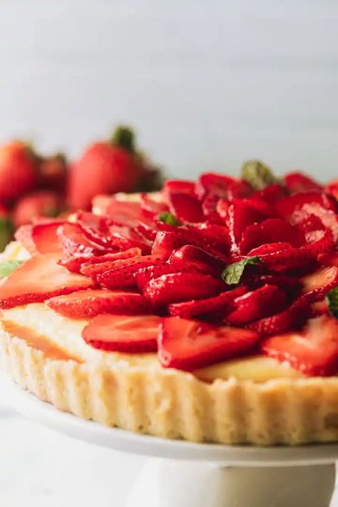 With a simple buttery shortbread cookie crust and an easy, creamy vanilla pastry cream custard filling, this strawberry custard tart is the perfect dessert for any occasion. Fruit Tart Recipe Easy, Strawberry Custard, Shortbread Cookie Crust, Southern Banana Pudding, Fruit Tart Recipe, Homemade Custard, Buttery Shortbread Cookies, Strawberry Tart, Custard Tart