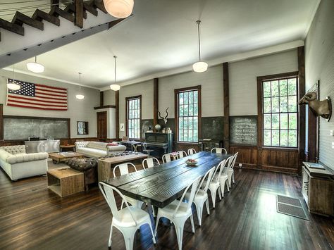 Choosing an 1893 one-room schoolhouse as the place to start an inn doesn't seem like the most practical choice, unless you're not expecting many guests, but that's exactly what the owners of this home did. After a year of renovations beginning in 2012, Hillside Schoolhouse, which was also a gospel church in the 1950s but had been empty since 2000, became a boutique inn. It now has two bedroom suites, but all of the original historical details including original windows, floors and slate... Old School House, Wood Staircase, Country Style Kitchen, Old House Dreams, Bedroom Suite, Kitchen Styling, House Inspiration, House Rooms, Living Dining Room