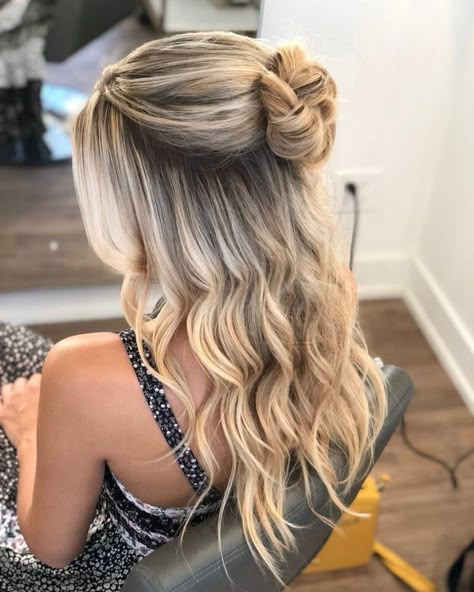 Easy Wavy Hairstyle with Half-Up Bun Bun And Curls Half Up, Teased Half Up Half Down Hair, Messy Half Up Half Down Bun Curly Hair, Curly Half Up Half Down Bun, Half Up Half Down Hairstyles Bun, Half Up Half Down Hair With Bun, Half Up Half Down Bun Wedding Hair, Simple Half Up Half Down Hair, Half Up Half Down Bun Curly Hair