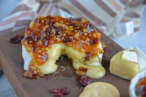 Apricot Cranberry Baked Brie - The BEST Baked Brie Recipe - Apricot Cranberry Baked Brie is the ultimate appetizer. This baked brie appetizer will be perfect for any party or romantic evening in. #apricotcranberrybakedbrie Best Baked Brie, Apricot Preserves Recipe, Cranberry Baked Brie, Cranberry Topping, Baked Brie Honey, Easy Baked Brie Recipe, Cranberry Appetizer, Baked Brie Recipe, Baked Brie Appetizer