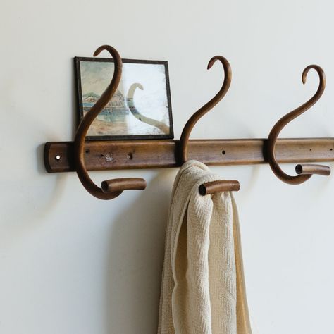 Bentwood Coat Rack, Coat Rack Styling, Vintage Wall Hooks, Wall Hooks Ideas, Picture Arrangements On Wall, Wall Arrangements, Entry Area, Farmhouse Kitchen Inspiration, Western Gothic