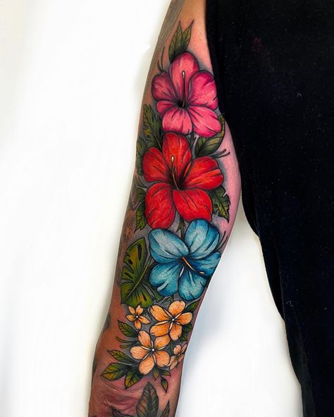 Hawaiian Florals I made this week for Halie 🌺 Made in one full day session Part of a full sleeve in progress! More full color florals forever pls & thank you maxwoodstattoos.com for booking - - - - - - - - #art #artist #tattooartist #tattoo #color #floral #floraltattoo #hawaii #hawaiian #hawaii #colorfloral #leaves #neotraditionaltattoo #dfw #dfwtattoos #dfwtattooartist #lewisvilletx #rebelmusetattoo Tropical Leg Sleeve, Jungle Floral Tattoo, Jungle Flowers Tattoo, Tropical Flower Shoulder Tattoo, Hawaiian Foliage Tattoo, Jungle Leaves Tattoo, Tropical Leaves And Flowers Tattoo, Jungle Flowers, Leaf Tattoos