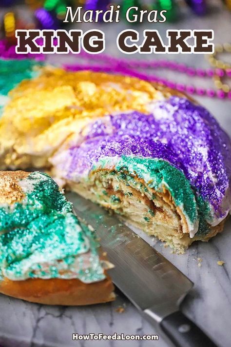 Mardi Gras King Cake is a celebration of the biggest party in the world, but is truly delicious. Layers of buttery cinnamon in a moist cake topped with a sweet icing and brightly colorful sugar. Get the complete recipe with ALL-NEW VIDEO on the blog! Fiesta Cakes, Classic Cajun Recipes, King Cake Recipe, Mardi Gras King Cake, Sugar Dough, Mardi Gras Food, Cinnamon Recipes, King Cake, Savoury Cake