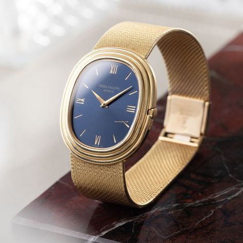 Patek Philippe Golden Ellipse Listing: $21,185 Patek Philippe Ellipse 3634/2 18 k Yellow Gold Engraved Dial, Reference number 3634; Yellow gold; Automatic; Condition Very good; Year 1970; Location: The Ne Patek Philippe Ellipse, Patek Phillipe, Roman Numeral Bracelet, The Nautilus, Vintage Timepiece, Authentic Watches, Jewelry Clasps, Watch Lover, Gold Engraving